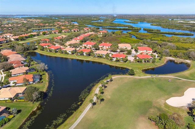 drone / aerial view with a water view