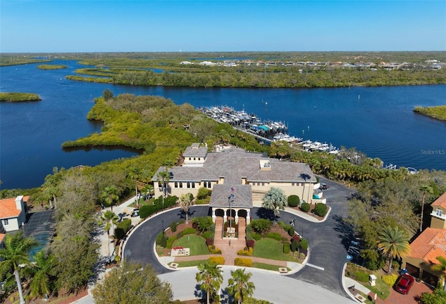 drone / aerial view with a water view