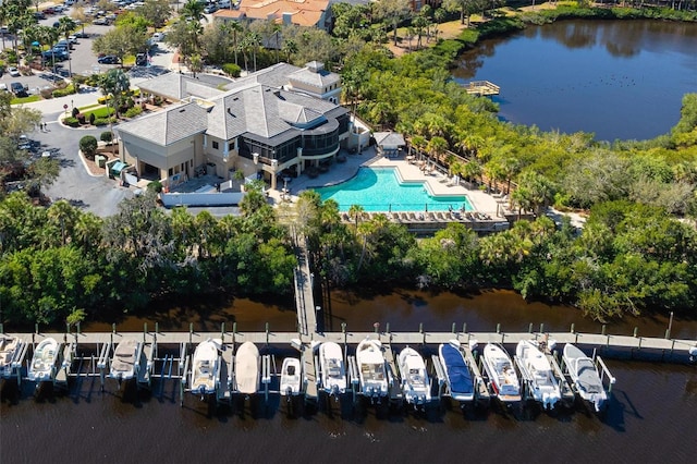 birds eye view of property featuring a water view