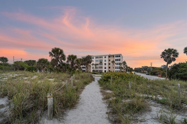 outdoor building at dusk with a water view