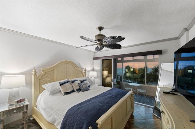 bedroom featuring crown molding, ceiling fan, and a textured ceiling