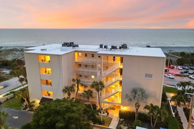 outdoor building at dusk with a water view