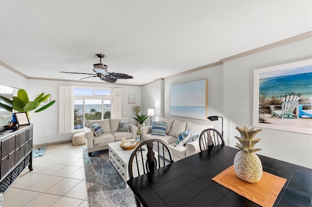 dining room with light tile patterned floors, crown molding, and ceiling fan