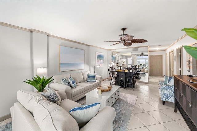 tiled living room featuring ceiling fan and ornamental molding