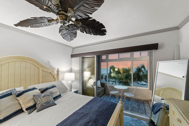 bedroom with ceiling fan, ornamental molding, and a textured ceiling