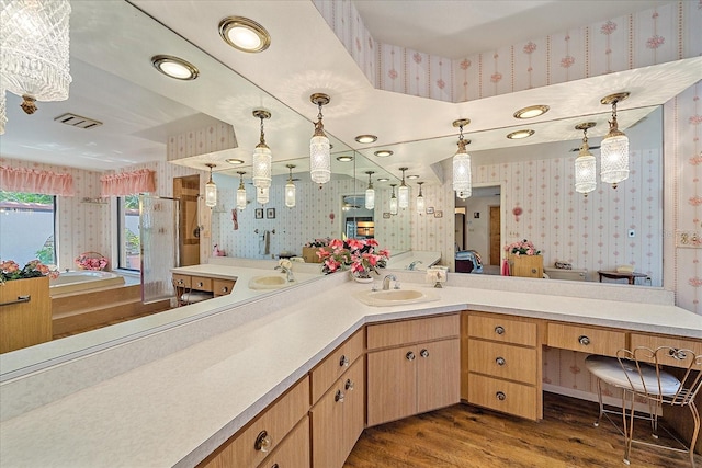 bathroom with vanity, wood-type flooring, and separate shower and tub