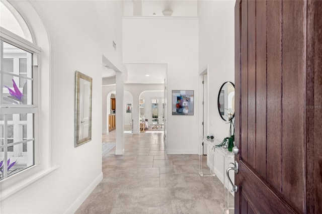 entryway with a high ceiling