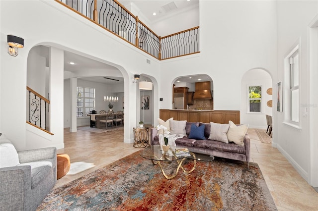 living room with a high ceiling