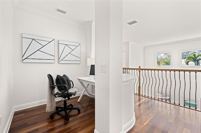 office space featuring dark hardwood / wood-style flooring and ornamental molding