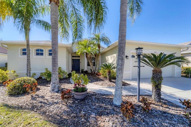 single story home featuring a garage