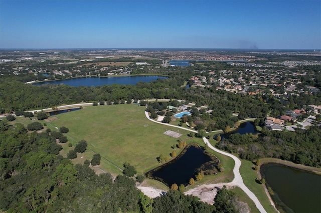 birds eye view of property featuring a water view