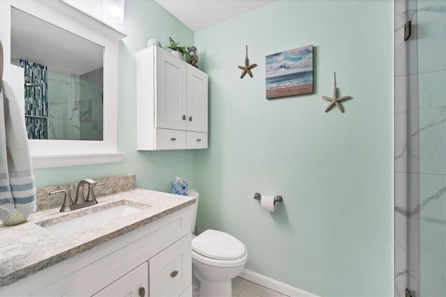 bathroom with toilet, a shower with door, large vanity, and tile floors