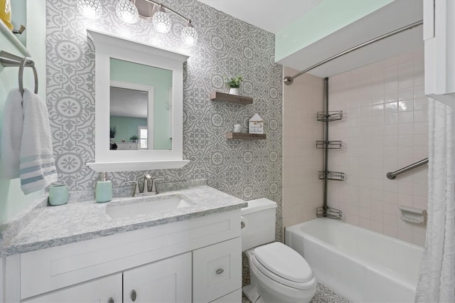 full bathroom with shower / bath combination with curtain, vanity with extensive cabinet space, and toilet