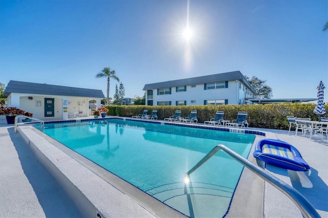 view of swimming pool with a patio area