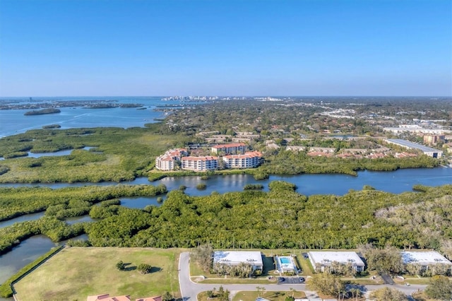 bird's eye view with a water view