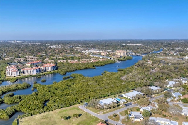 drone / aerial view with a water view