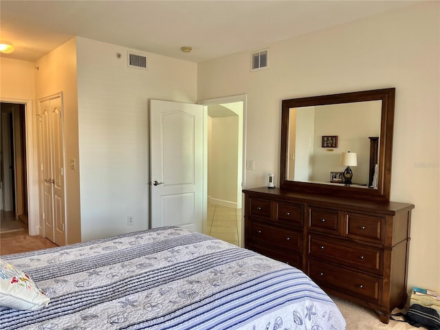 bedroom with light tile flooring