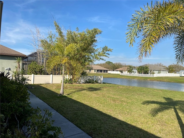 view of yard with a water view