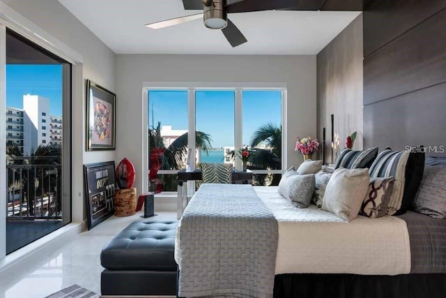 bedroom featuring access to exterior and ceiling fan