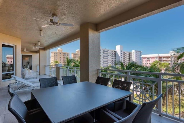 balcony featuring ceiling fan