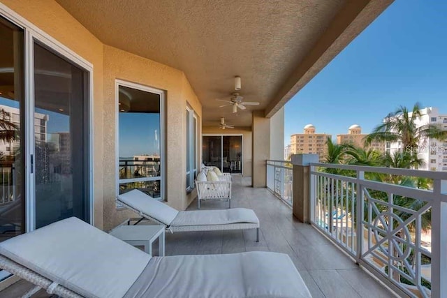 balcony featuring ceiling fan