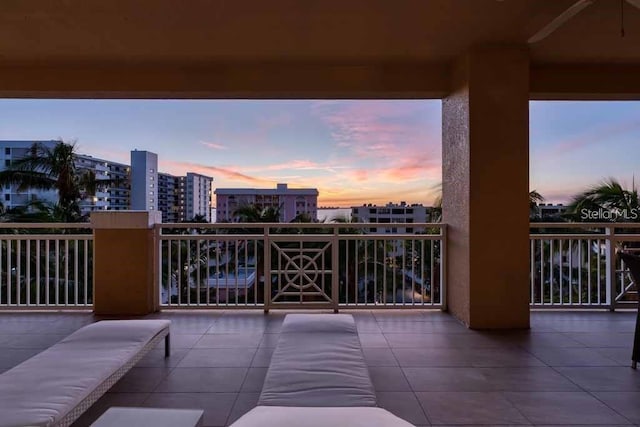 view of balcony at dusk