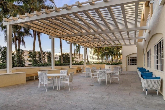 view of terrace featuring a pergola