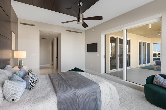 bedroom featuring access to outside, a ceiling fan, and visible vents