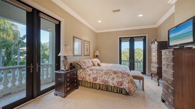 carpeted bedroom with access to outside, crown molding, and french doors