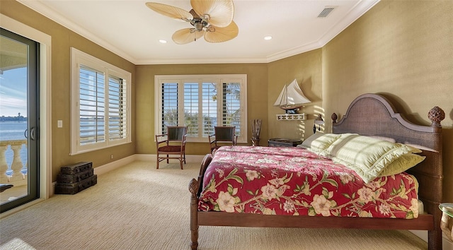 bedroom with ceiling fan, light colored carpet, crown molding, access to exterior, and a water view