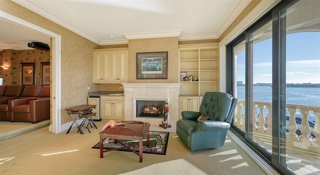 interior space featuring sink, a premium fireplace, light colored carpet, a water view, and crown molding