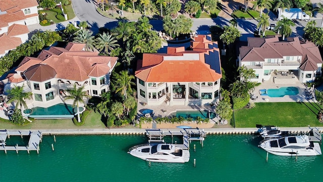 bird's eye view with a water view