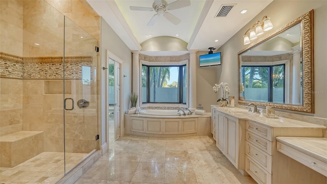 bathroom featuring vanity, separate shower and tub, ceiling fan, and a wealth of natural light