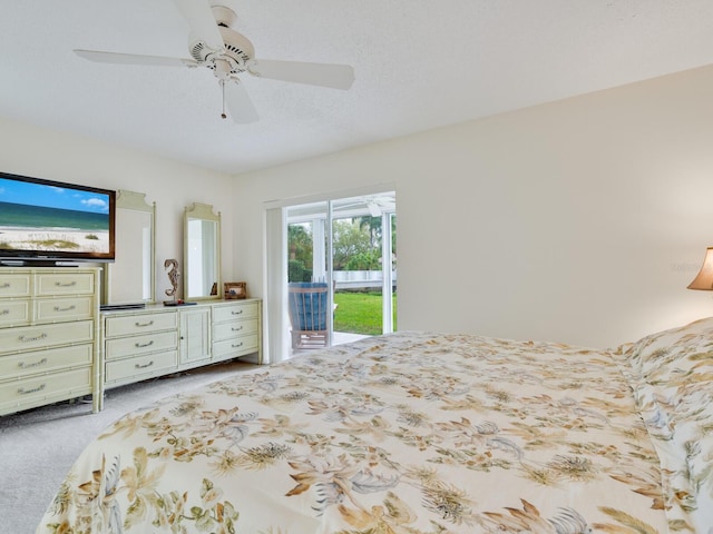 unfurnished bedroom featuring light carpet, ceiling fan, and access to outside