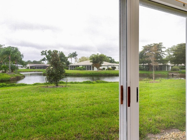 view of yard with a water view