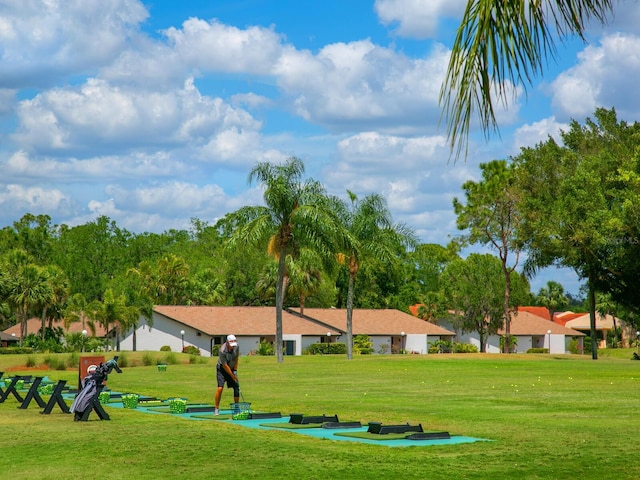 surrounding community featuring a lawn