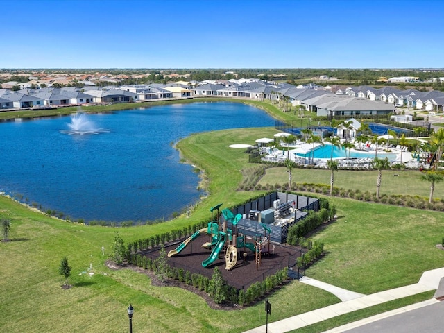 birds eye view of property featuring a water view