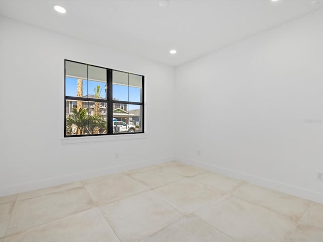 empty room featuring light tile patterned flooring