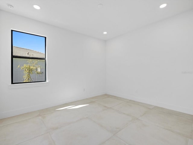 empty room with light tile patterned floors