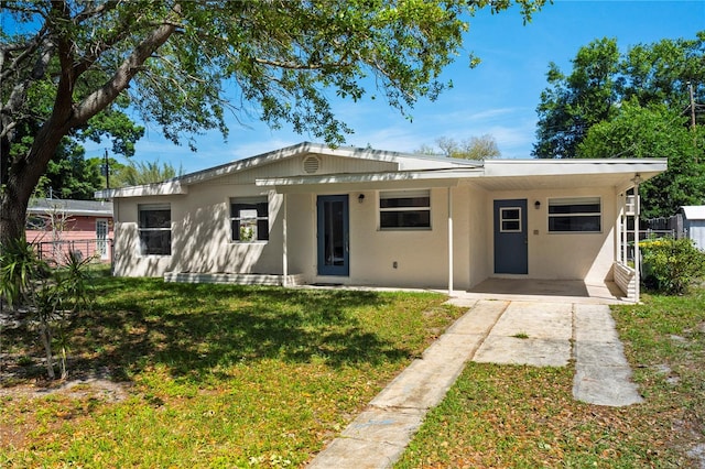 view of front of house with a front lawn