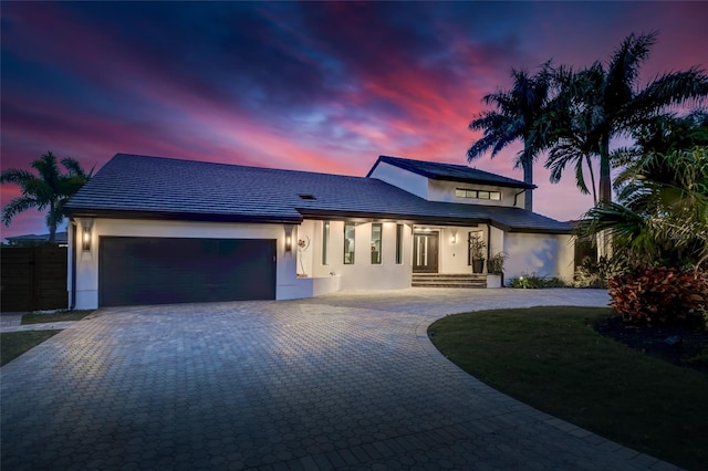 prairie-style home featuring a garage