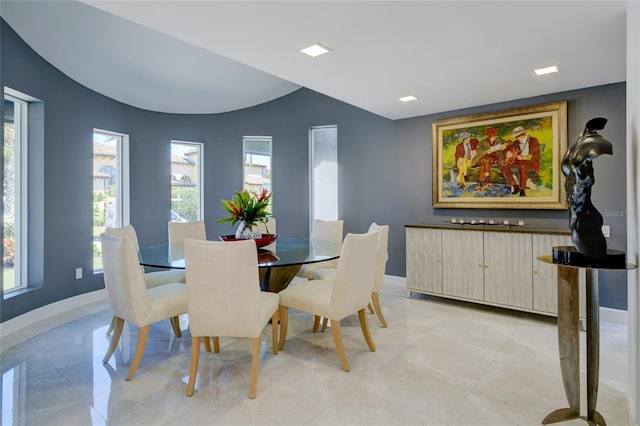 dining area with light tile floors