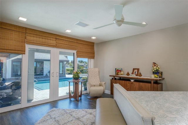 bedroom featuring french doors, access to outside, ceiling fan, and dark hardwood / wood-style flooring