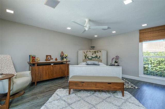 bedroom with ceiling fan and dark hardwood / wood-style floors