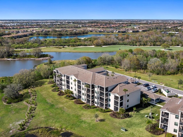 drone / aerial view featuring a water view