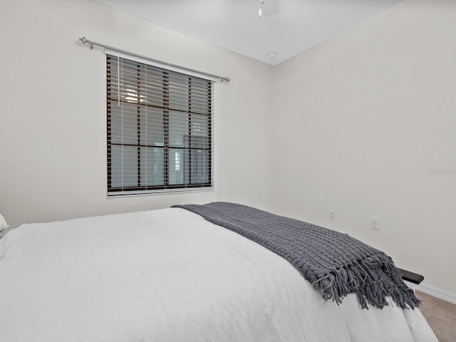 bedroom with carpet floors and ceiling fan