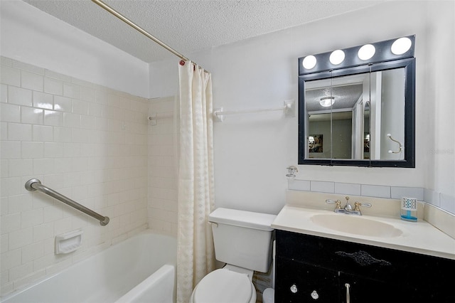 full bathroom with shower / bath combo with shower curtain, vanity, toilet, and a textured ceiling