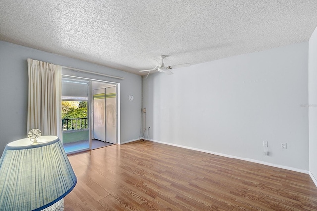 unfurnished room with hardwood / wood-style floors, a textured ceiling, and ceiling fan