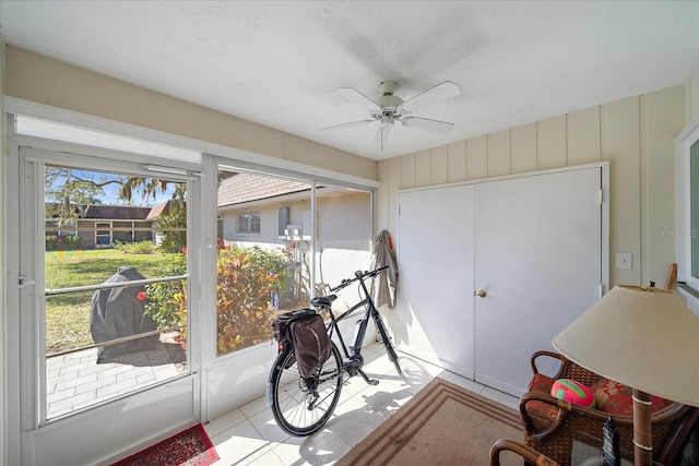 sunroom / solarium with ceiling fan