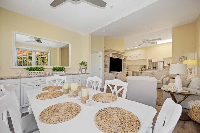 dining area with wood-type flooring